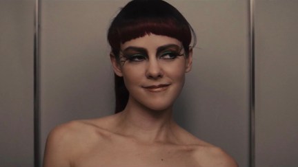 Johanna Mason smirking in the Hunger Games