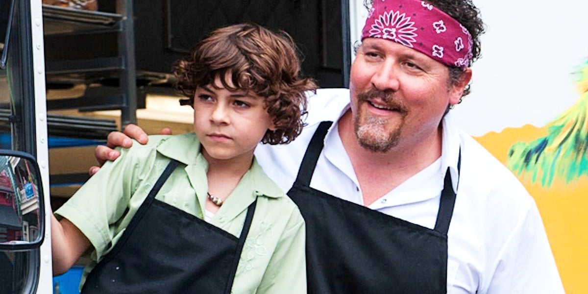 Jon Favreau as Carl Casper and Emjay Anthony as Percy in Chef