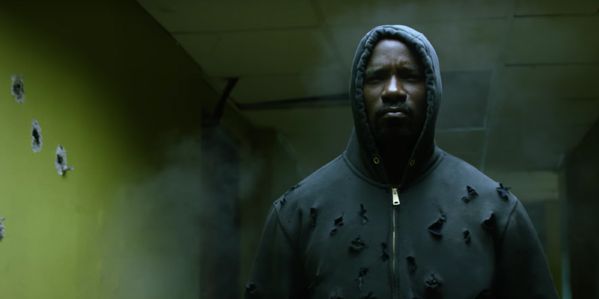 Mike Colter as Luke Cage in a bullet-riddled hoodie in Luke Cage season 1