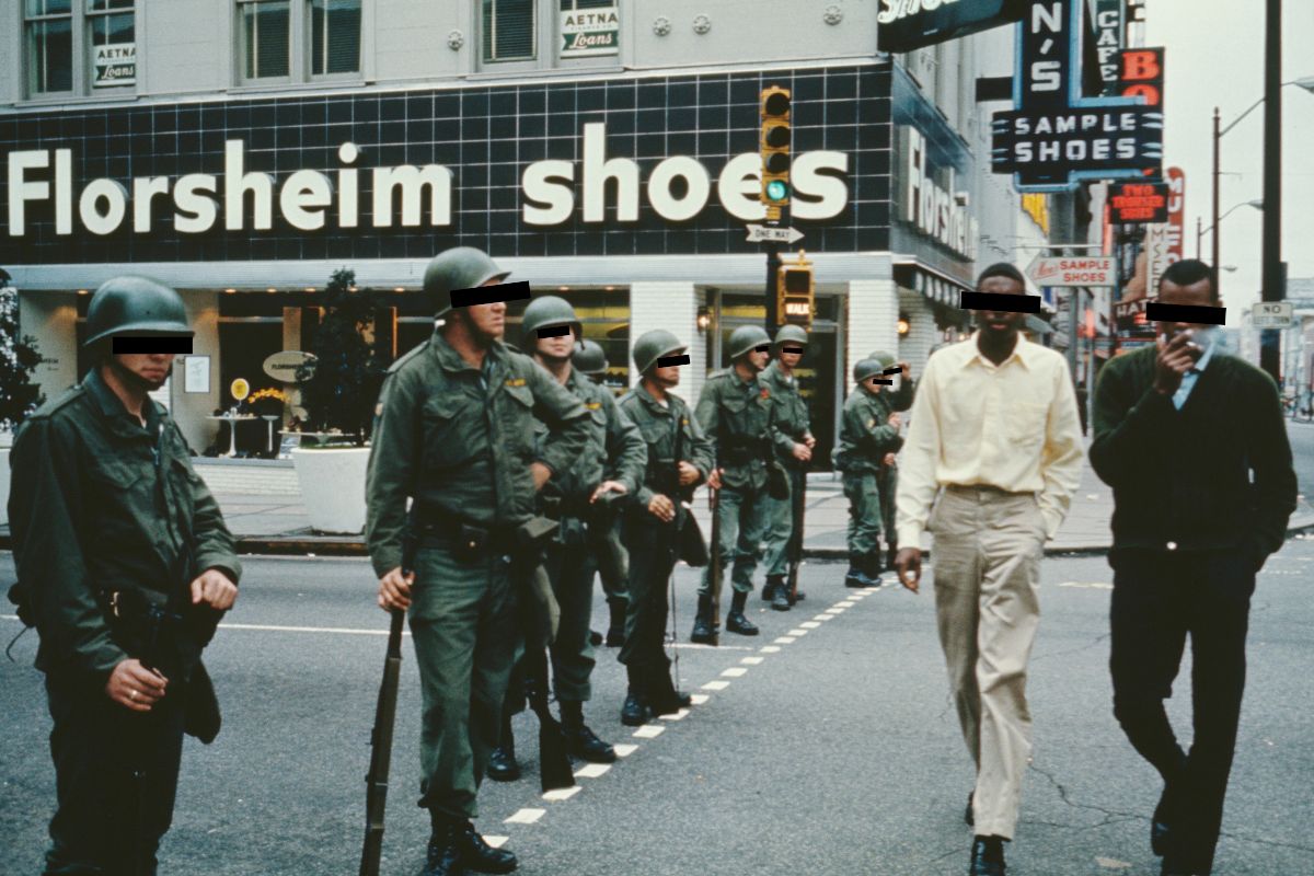 National guardsmen are called out in Memphis, Tennessee, following the assassination of civil rights leader Martin Luther King Jr in the city, 8th April 1968. They are guarding the street outside the Florsheim Shoes store. Alyssa covers eyes in editing.