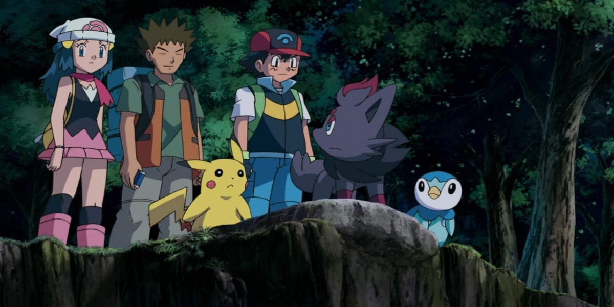 Screenshot from Pokémon: Zoroark: Master of Illusions. From left to right - Dawn, Brock, Pikachu, Ash, Zorua, Piplup