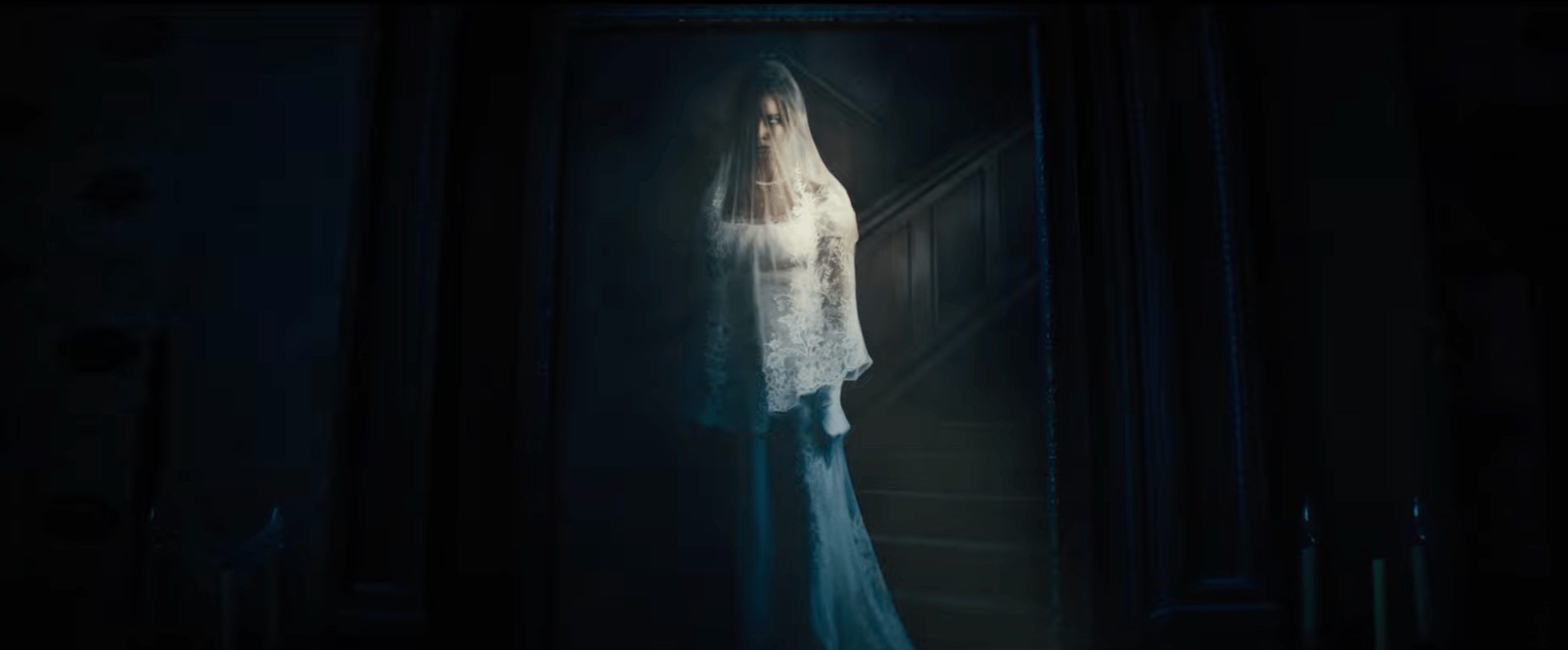 A portrait of constance Hatchaway in the haunted mansion trailer