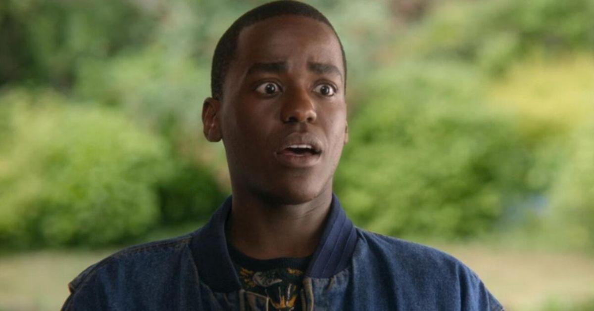 A close up of Effiong as he wears a dark jacket