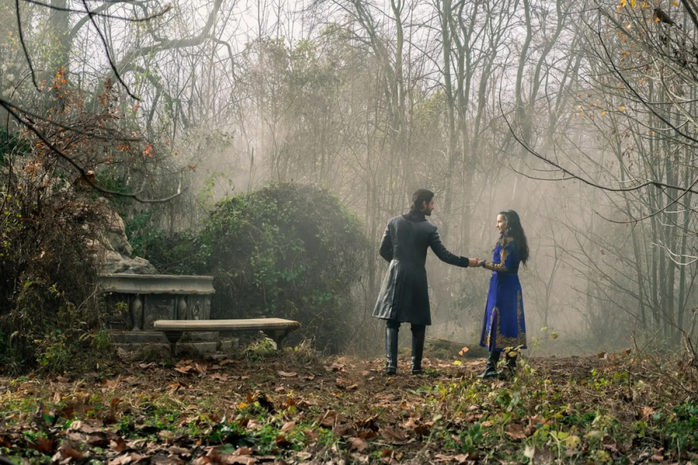 The Darkling (Ben Barnes) and Alina (Jessie Mei Li) stand in a forest in 'Shadow and Bone'