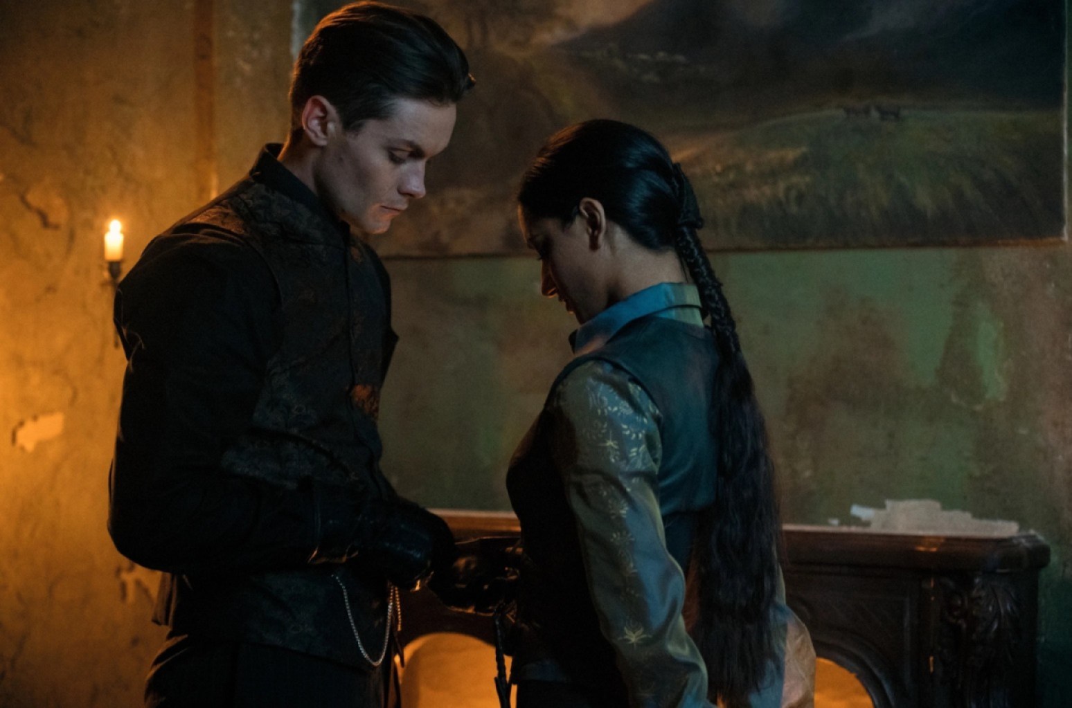 Kaz Brekker and Inej Ghafa, played by Freddy Carter and Amita Suman, share a moment in the second season of Netflix's Shadow and Bone