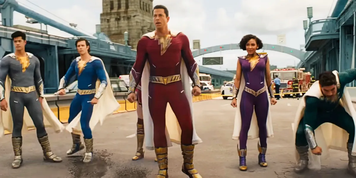 Shazam! Fury of the Gods, from left to right Ross Butler as Eugene Choi, Adam Brody as Freddy Freeman, Zachary Levi as Billy Batson, Meagan Good as Darla Dudley, and D.J. Cotrona as Pedro Peña