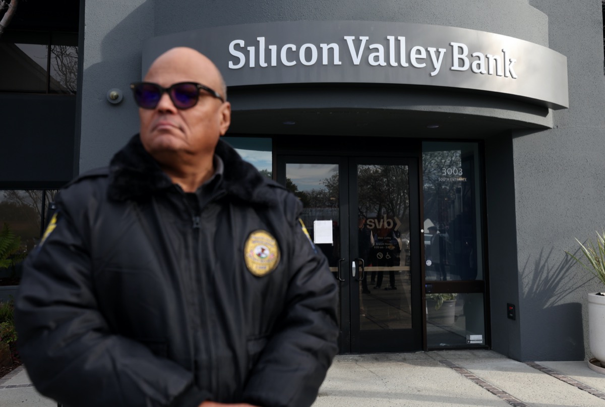 A security guard stands outside Silicon Valley Bank