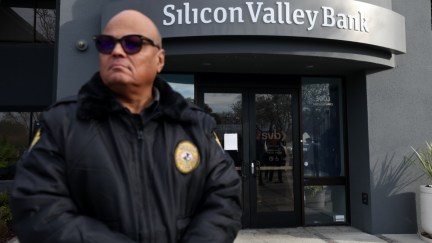 A security guard stands outside Silicon Valley Bank
