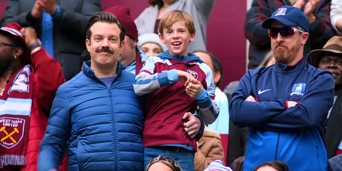Jason Sudeikis as Ted, Gus Turner as Henry Lasso and Brendan Hunt as Coach Beard in Ted Lasso season 3
