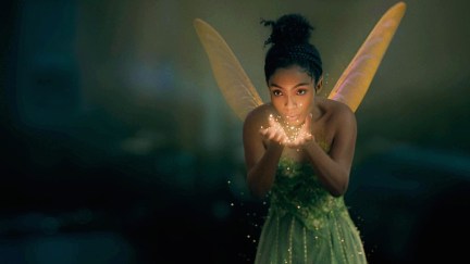Yara Shahidi as Tinker Bell blowing fairy dust in Peter Pan & Wendy