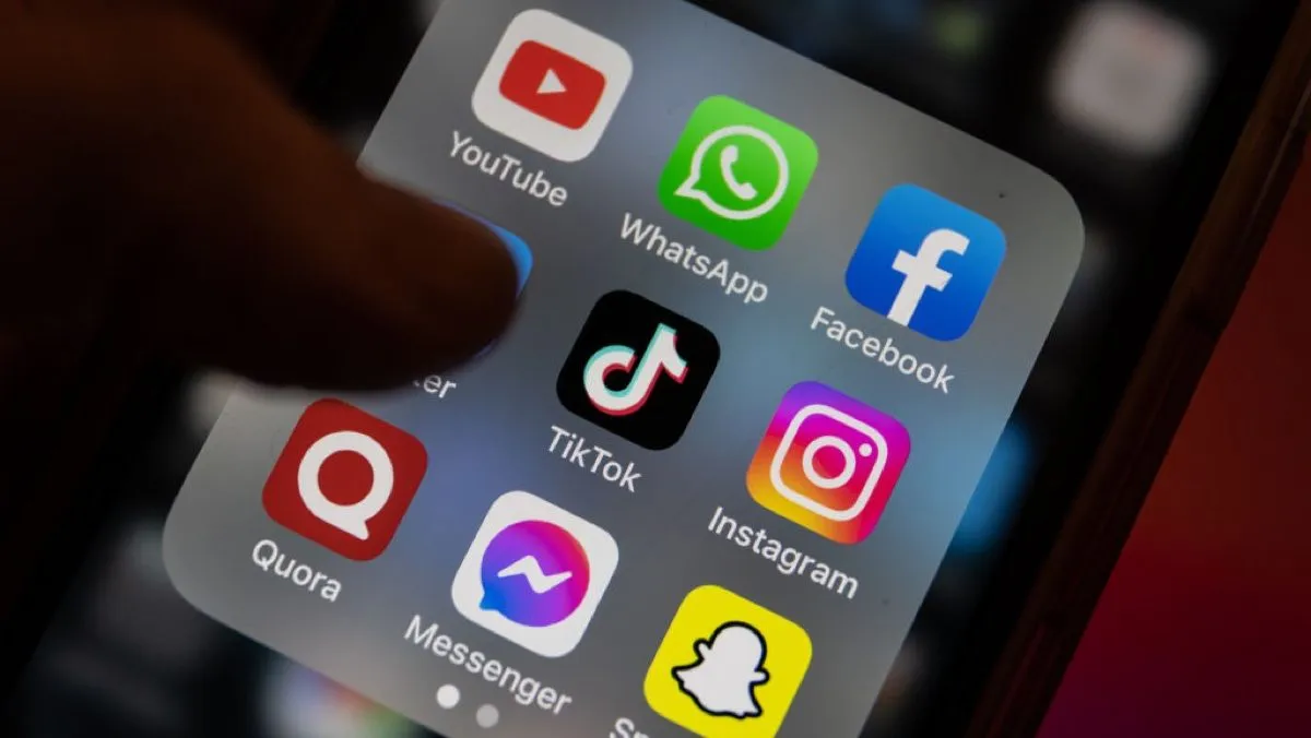 In this photo illustration the logo of Chinese online social media and video hosting service TikTok is displayed on a smartphone screen alongside that of that of YouTube, instant messaging software Whatsapp Facebook, Twitter, Instagram, Quora, Facebook Messenger and Snapchat.