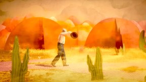 A man walks through a windy desert in popup book style in the Beau Is Afraid trailer.