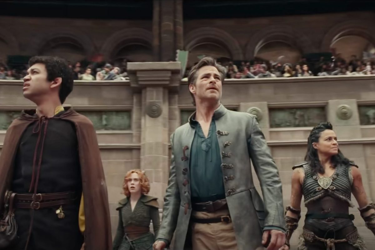 Edgin, Simon, Holga, and Doric stand in Forge's stadium, looking pensive.