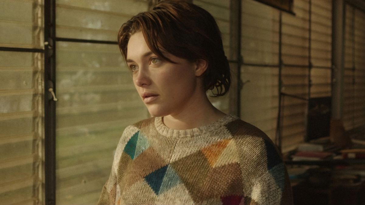 Florence Pugh in A Good Person looking out a window