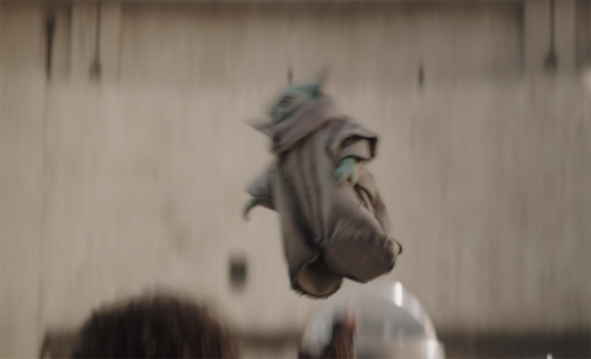 Grogu flying through the air on the Mandalorian