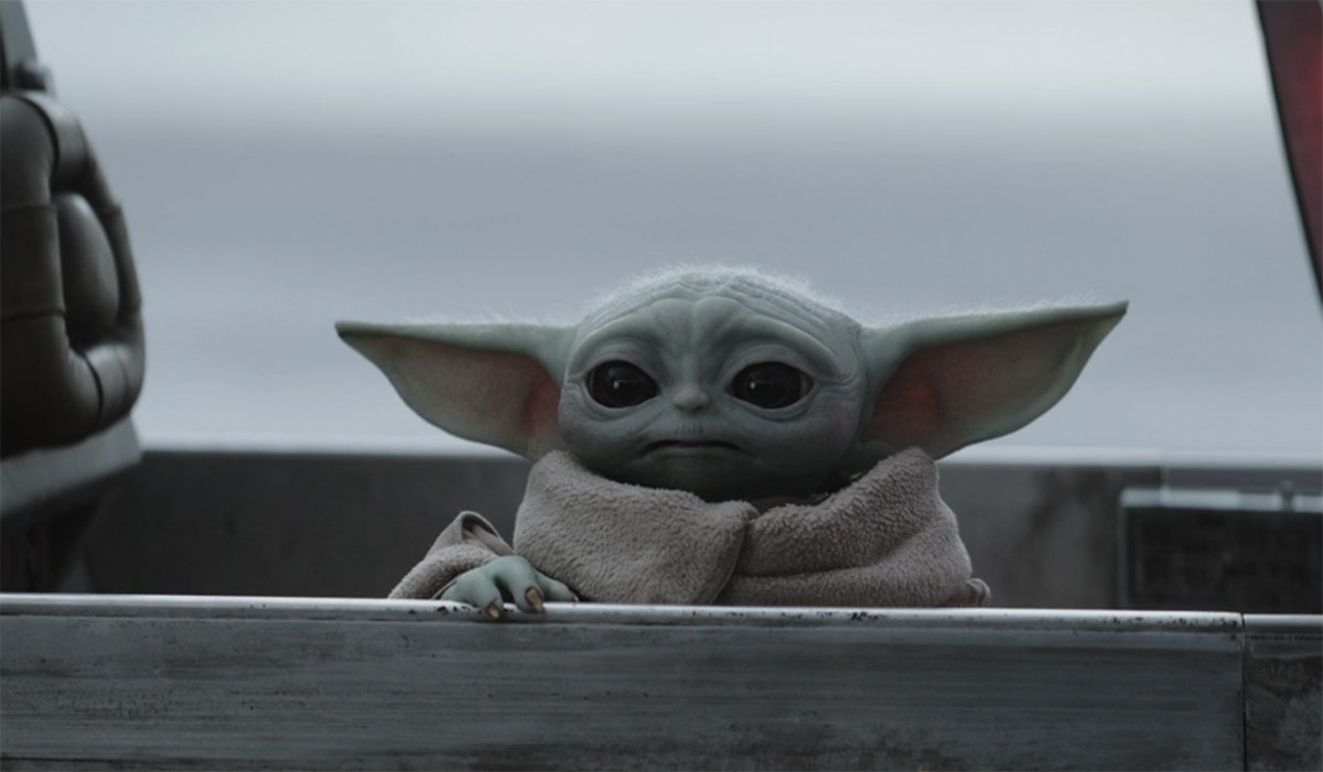 Grogu at Bo-Katan's house trying to tell her his dad is trapped in The Mandalorian