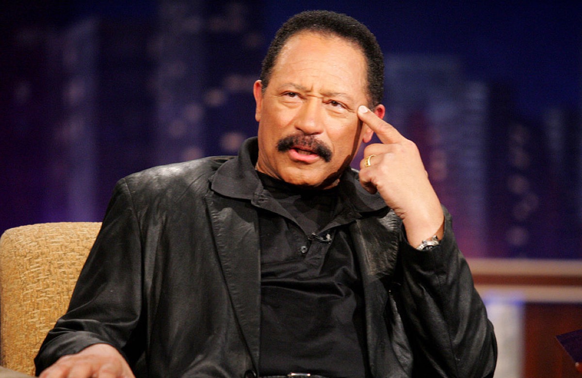 Judge Joe Brown on Jimmy Kimmel Live, looking confused and pointing to his own head.