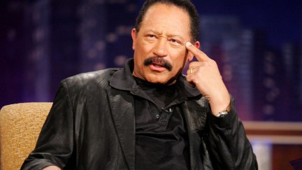 Judge Joe Brown on Jimmy Kimmel Live, looking confused and pointing to his own head.