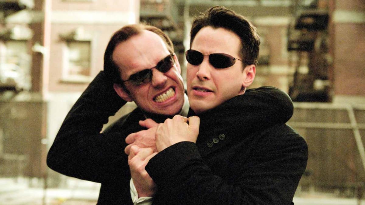 Keanu Reeves fights Agent Smith in The Matrix Reloaded.