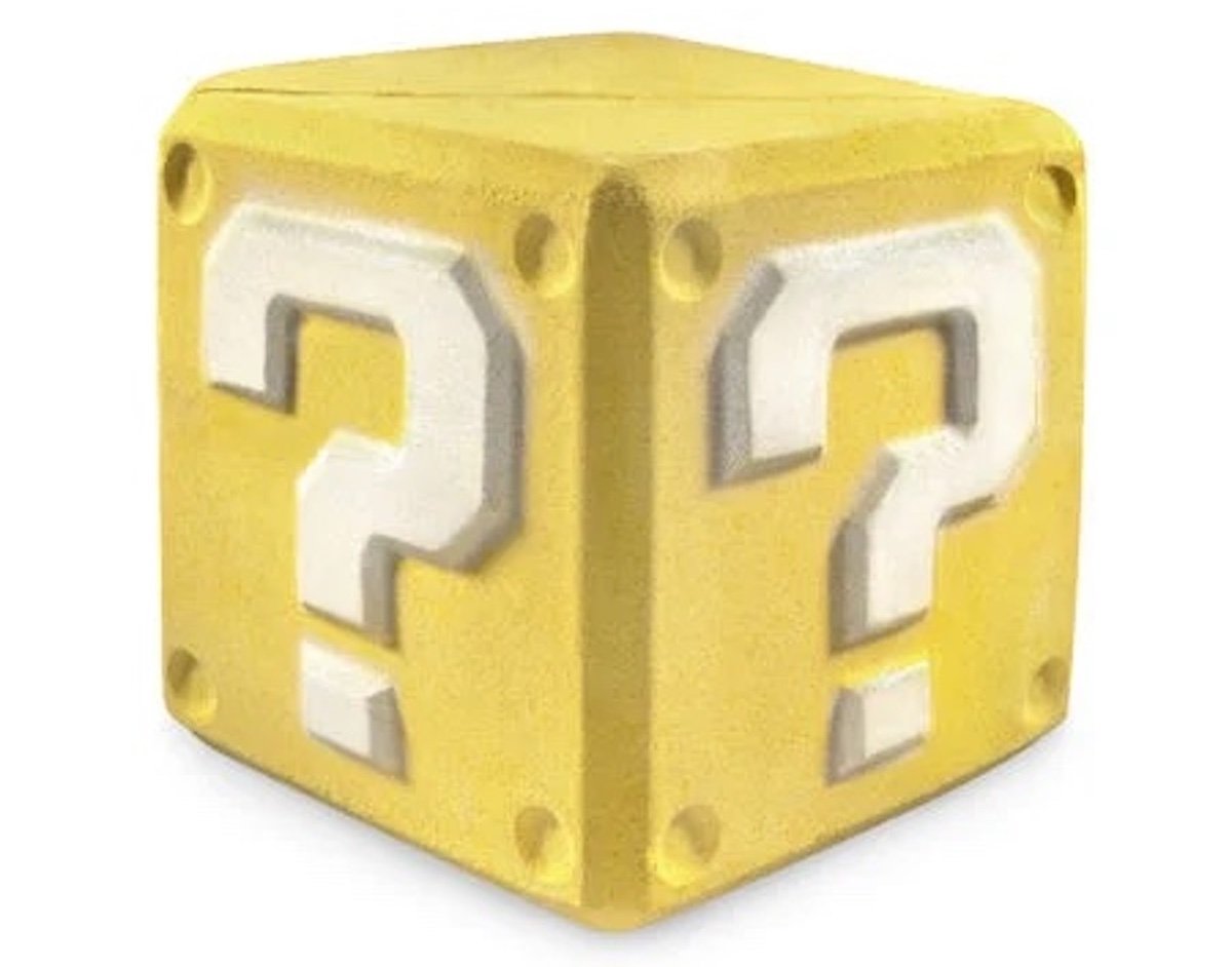 A bath bomb shaped like a question block from Super Mario Bros.