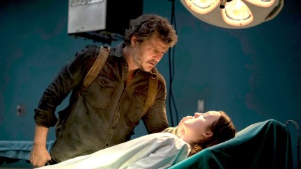 Joel looking at Ellie in the hospital in 'The Last of Us'