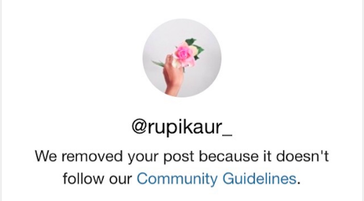A screenshot of a notification that an Instagram post has been taken down for violating community guidelines