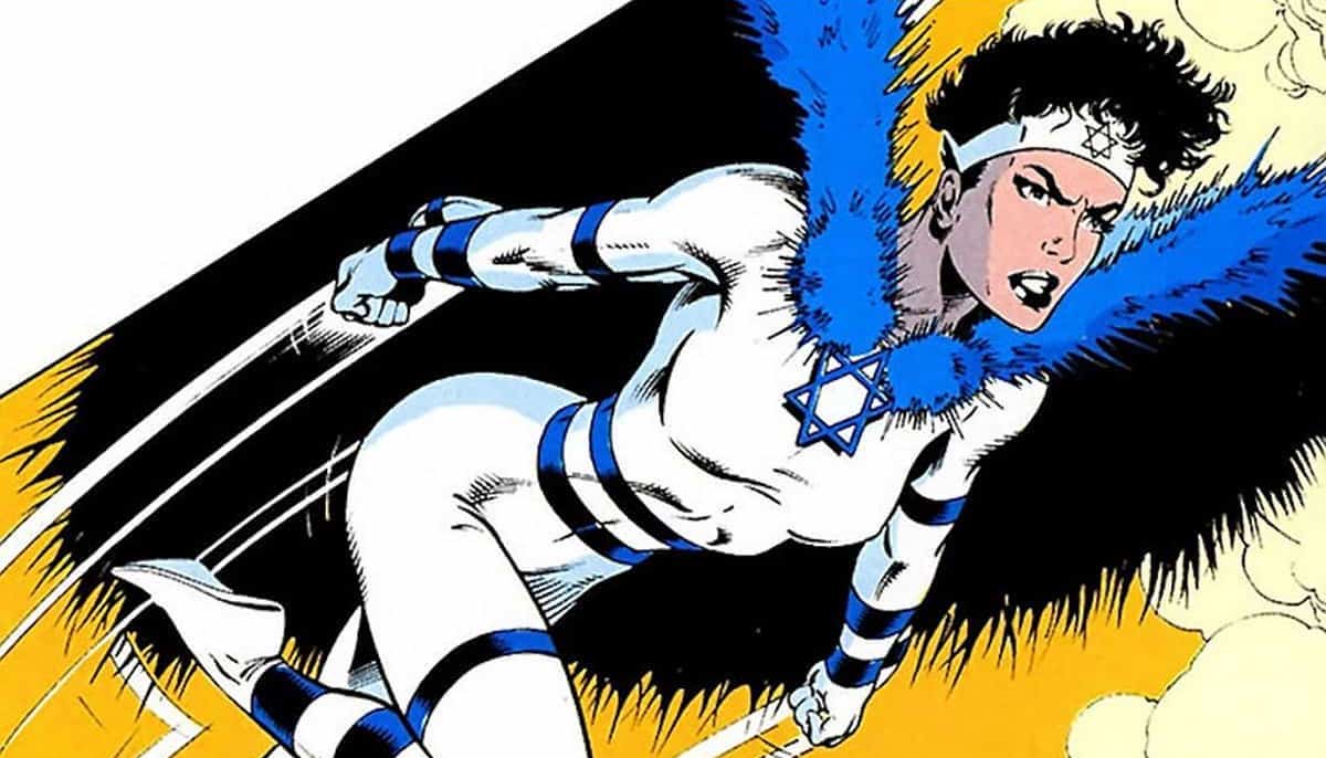 Sabra, a woman dressed in a superhero costume that looks like the Israeli flag, flies through the air.