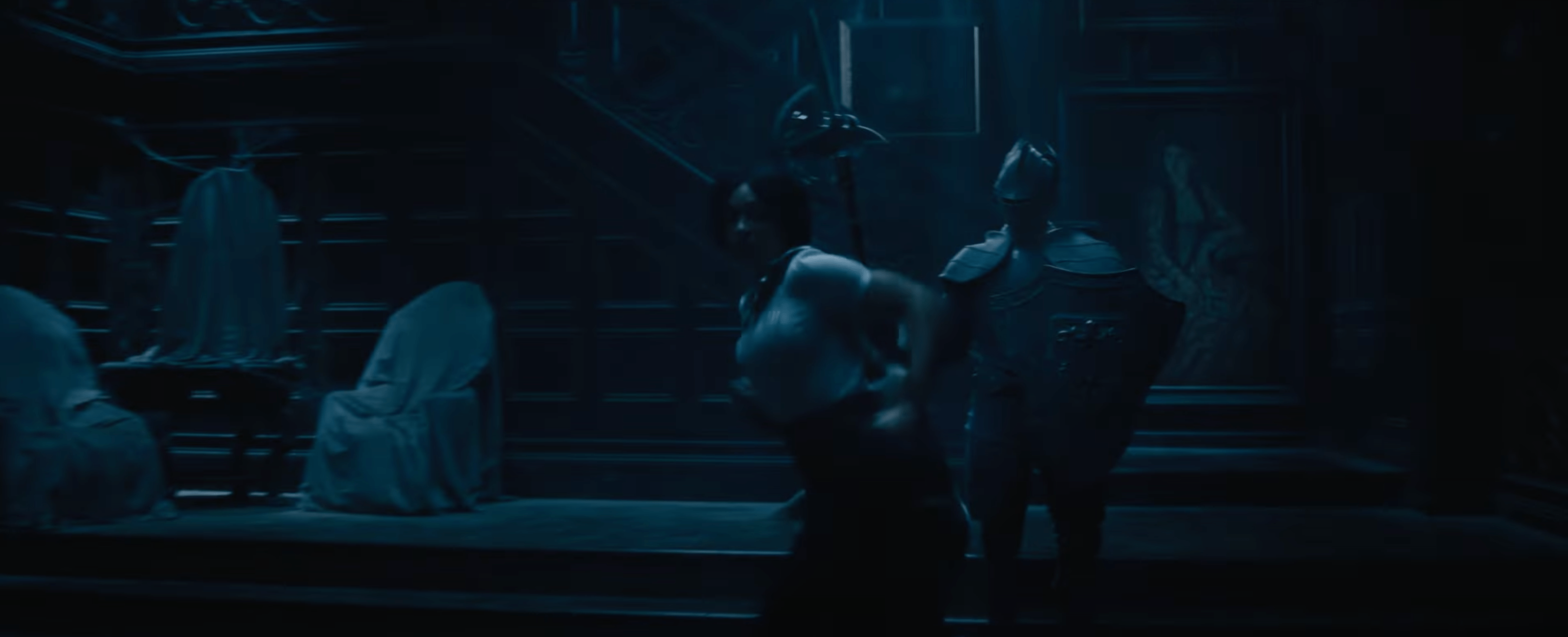 a moving suit of armor in the trailer for Disney's haunted mansion