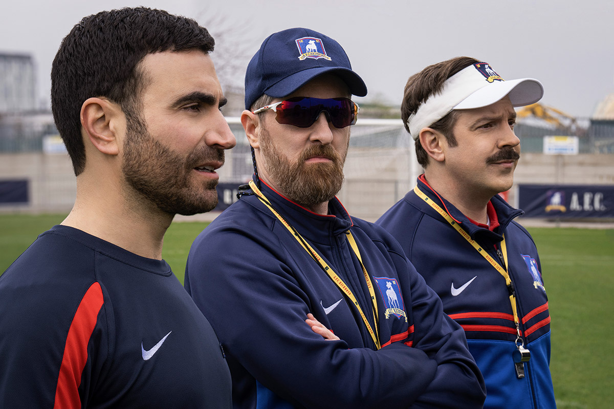 Brendan Hunt, Brett Goldstein, and Jason Sudeikis as Roy Kent, Beard, and Ted in Ted Lasso.