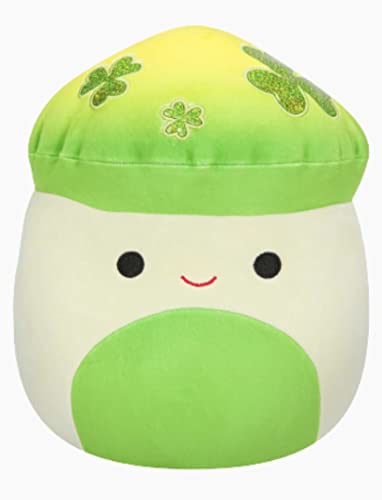 A pale green mushroom Squishmallow with a neon green tummy and cap, the cap has shamrock's on it.