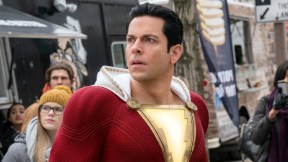 Zachary Levi looking confused in his superhero outfit in Shazam 2.