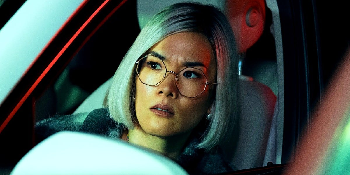 Ali Wong as Amy Lau sitting in her car in Beef