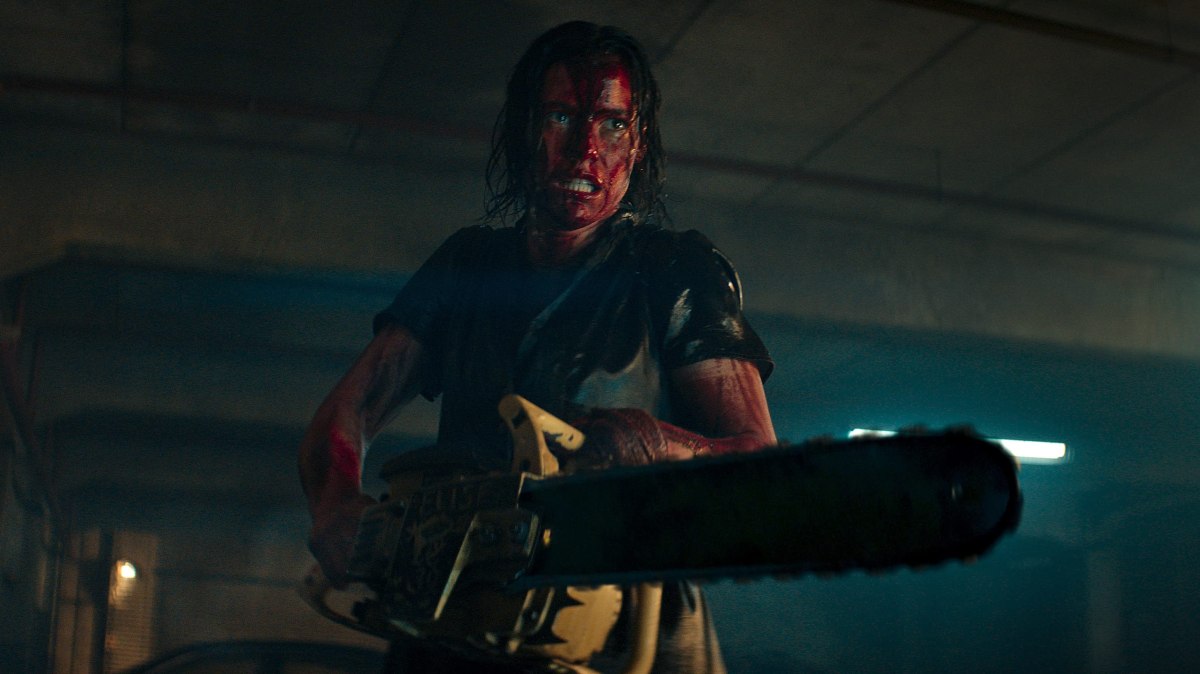 Beth being a badass with a chainsaw in Evil Dead Rise