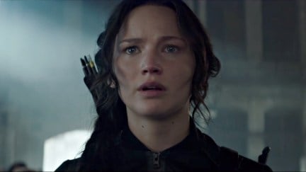 A close up of Katniss Everdeen as she looks shocked