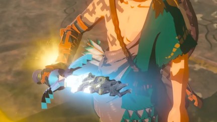Link's new arm, holding the master sword in 'The Legend of Zelda: Tears of the Kingdom'