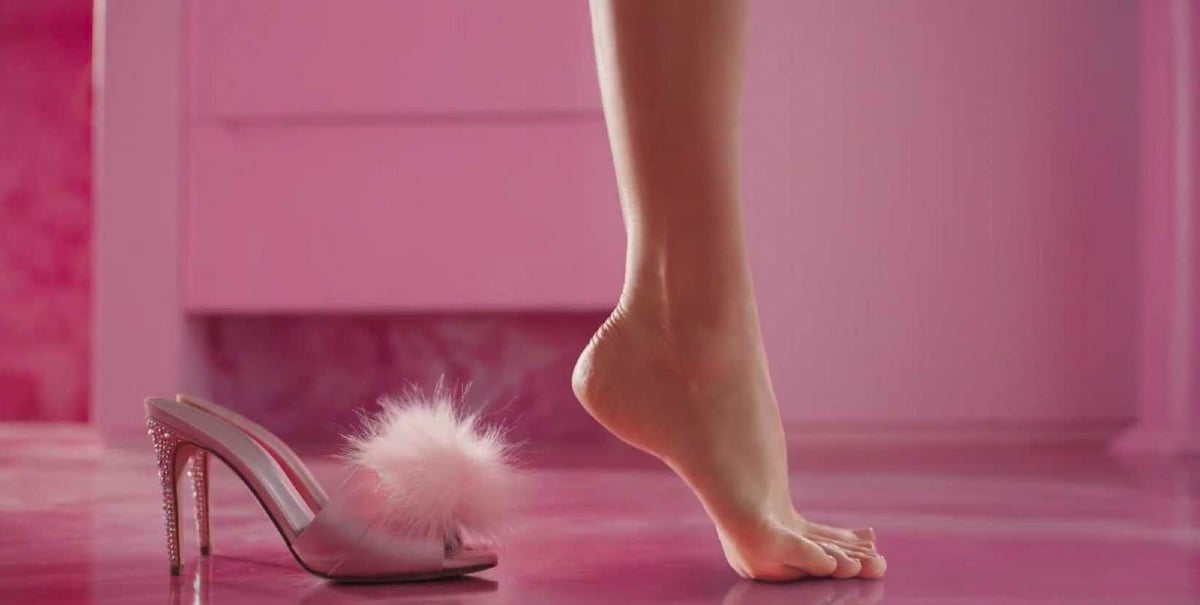 Barbie's feet step out of a pair of pink high-heels in the trailer for Greta Gerwig's 'Barbie'