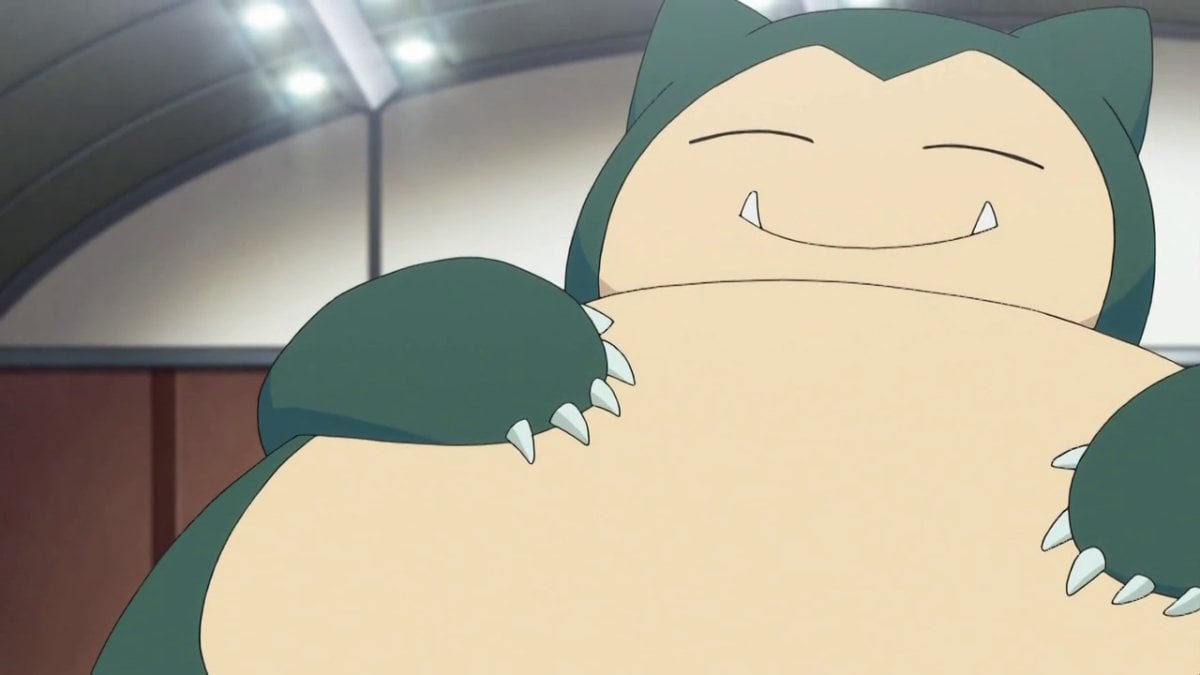 Snorlax smiling and looking pleased with itself (The Pokemon Company)