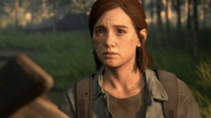 A close up of Ellie with tears in her eyes