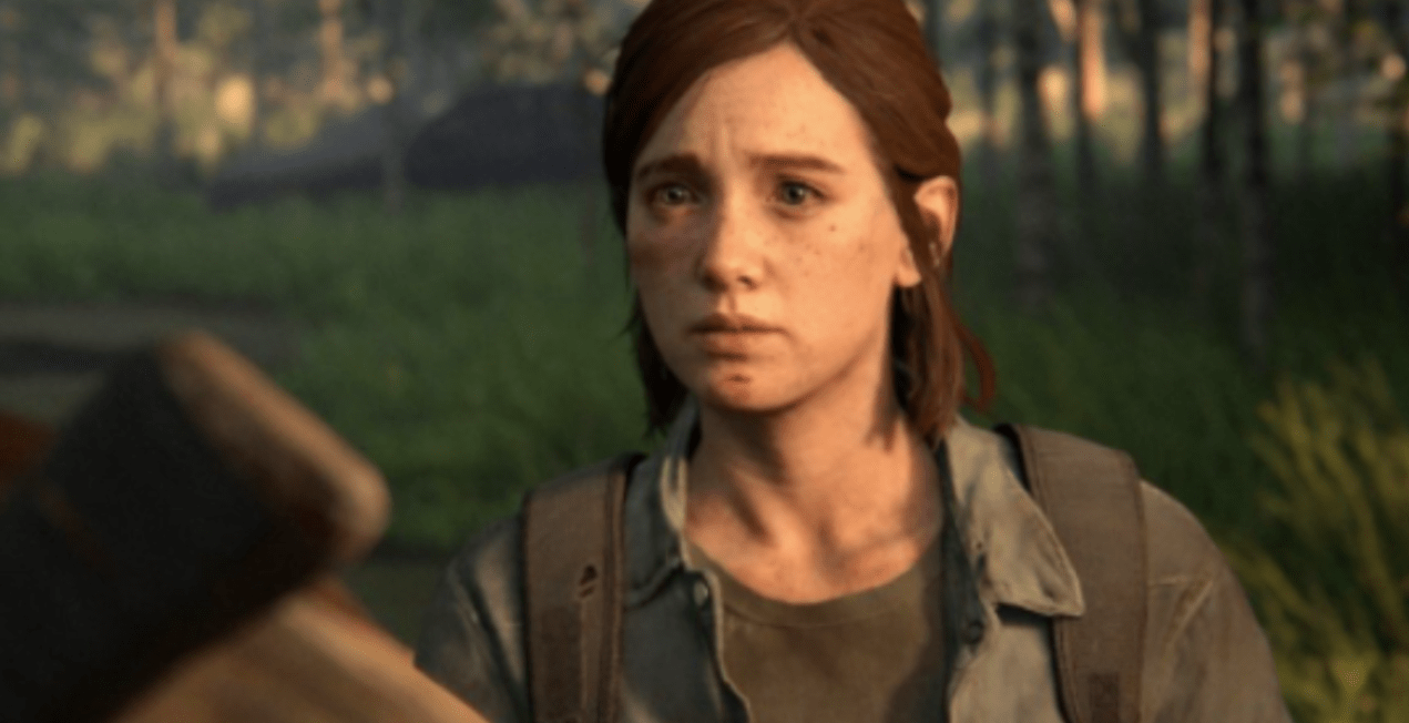 A close up of Ellie with tears in her eyes