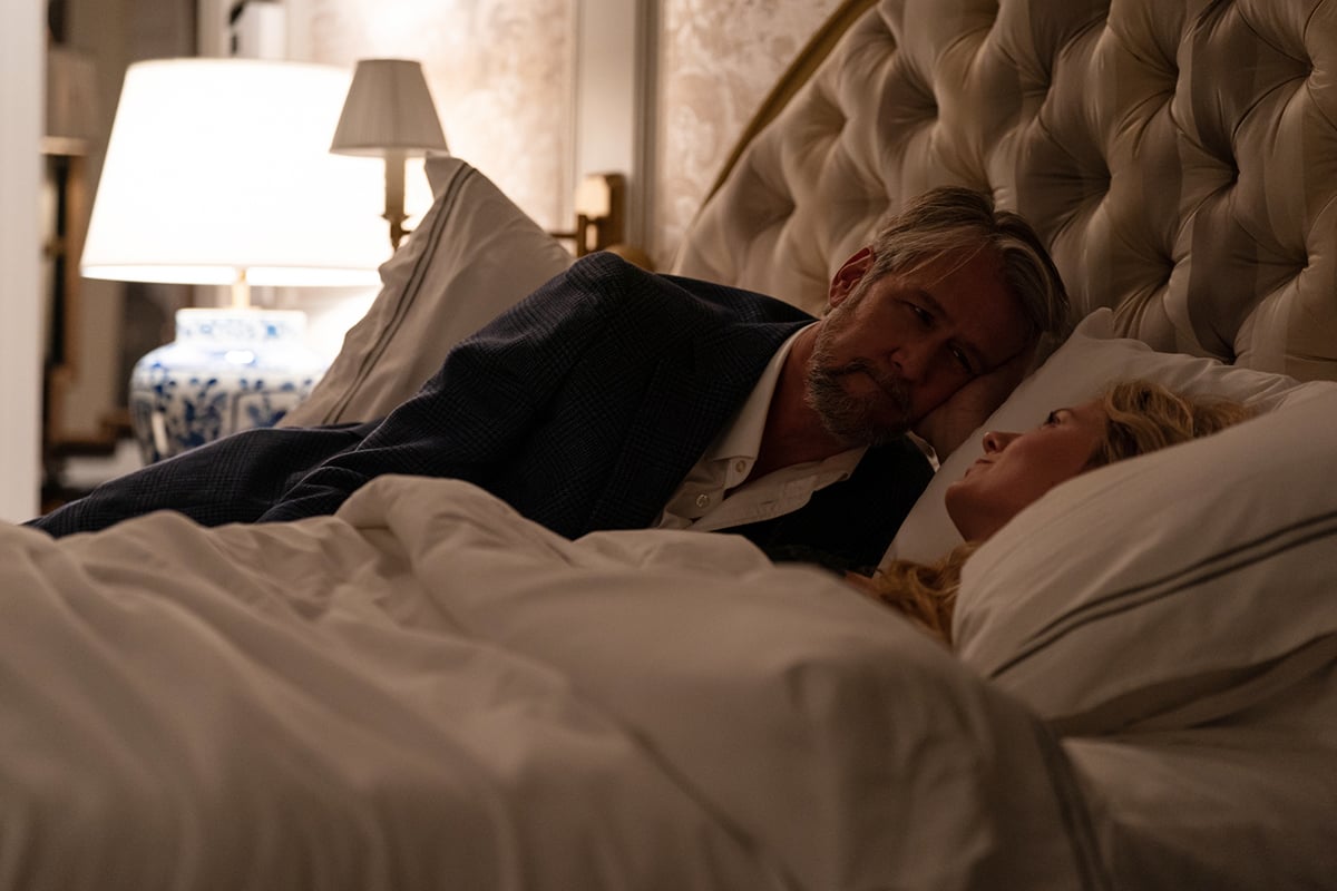 Connor Roy and Willa sitting in bed together on Succession