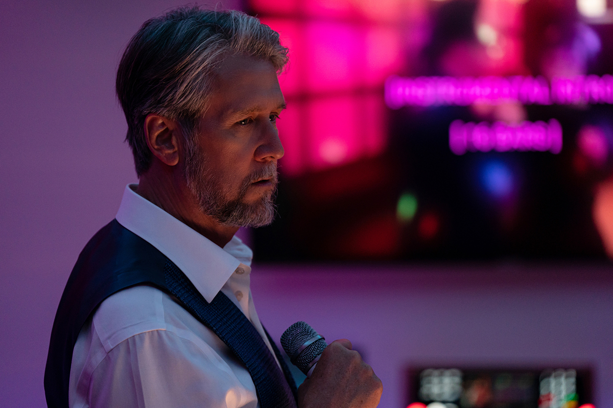 Alan Ruck as Connor Roy on Succession singing karaoke