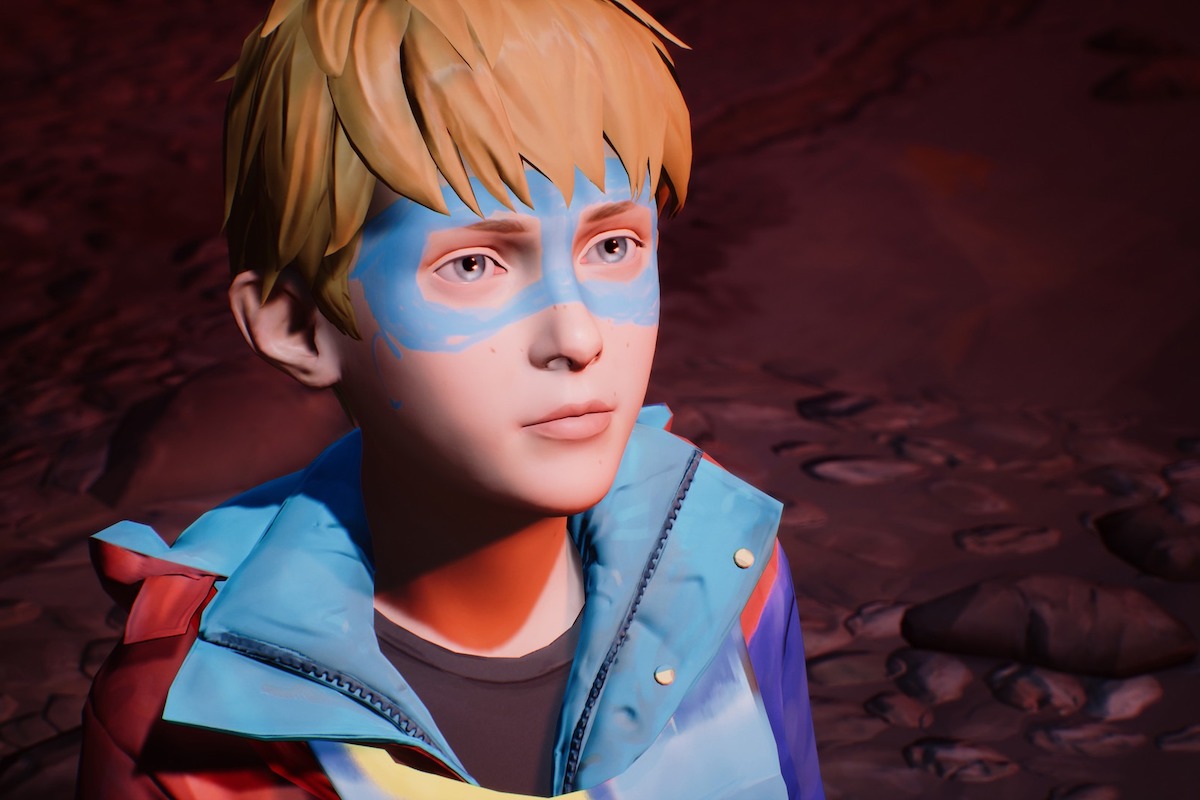 A young blonde boy video game character with a blue mask drawn onto his face like a superhero's mask
