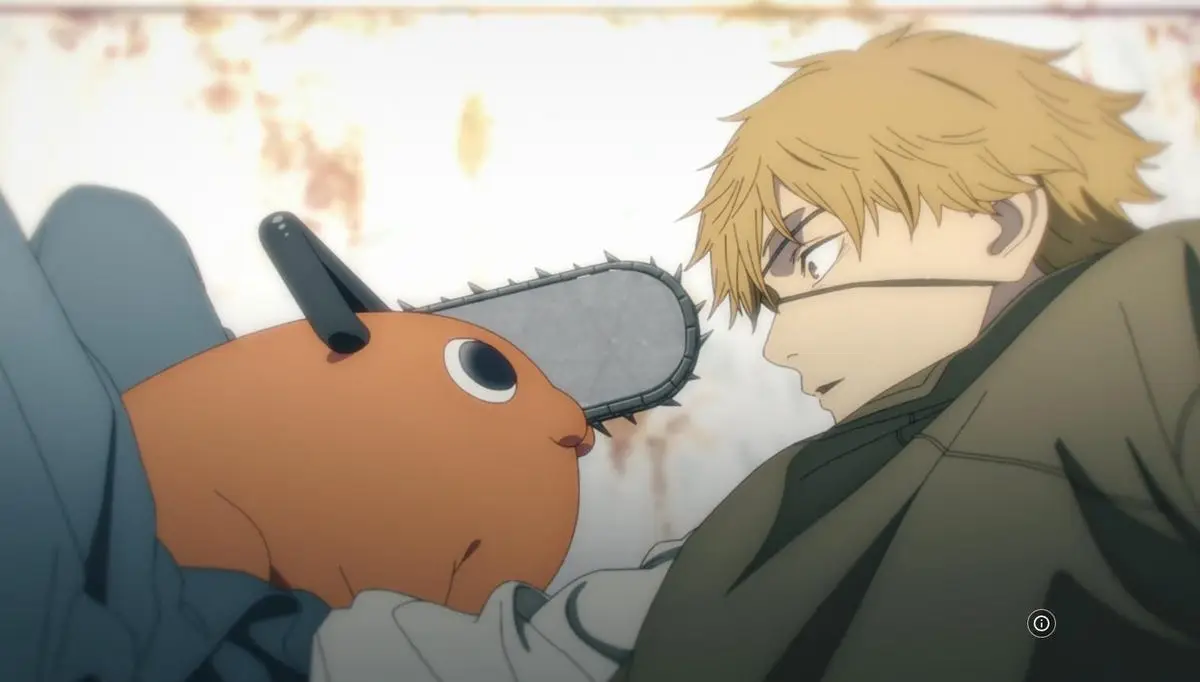 A little devil dog sits on a young man's lap in "Chainsaw Man"