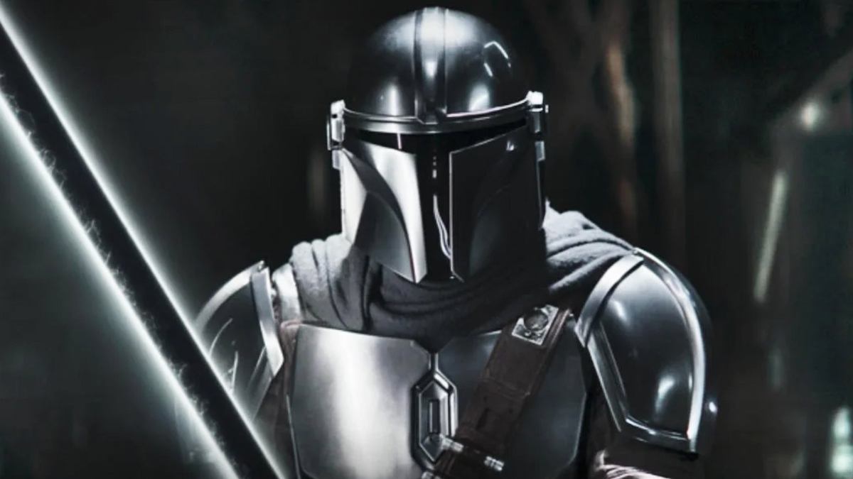 Pedro Pascal as Din Djarin with the Darksaber in 'The Mandalorian'