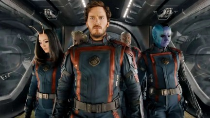 Mantis, Peter, and Nebula walk down a hallway in a spaceship.
