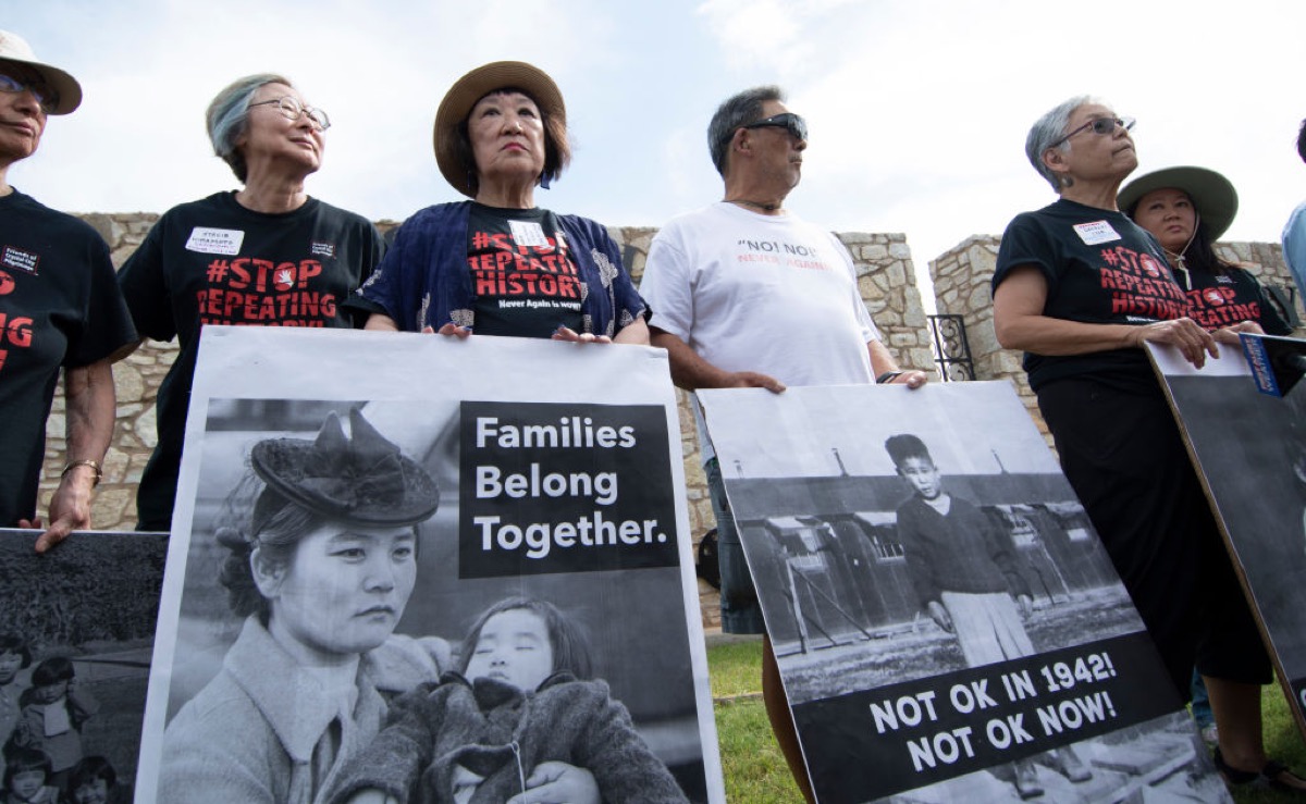 apanese Americans pose with photos of themselves taken while they were in relocation camps in WWII, during a press conference on June 22, 2019 in Lawton, Oklahoma to protest the military base, Fort Sill, being used to house 1,400 migrant children.