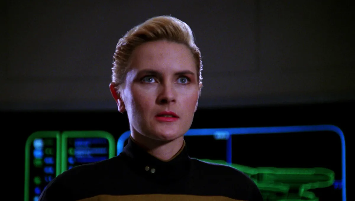 Tasha Yar looks worried on the Enterprise.