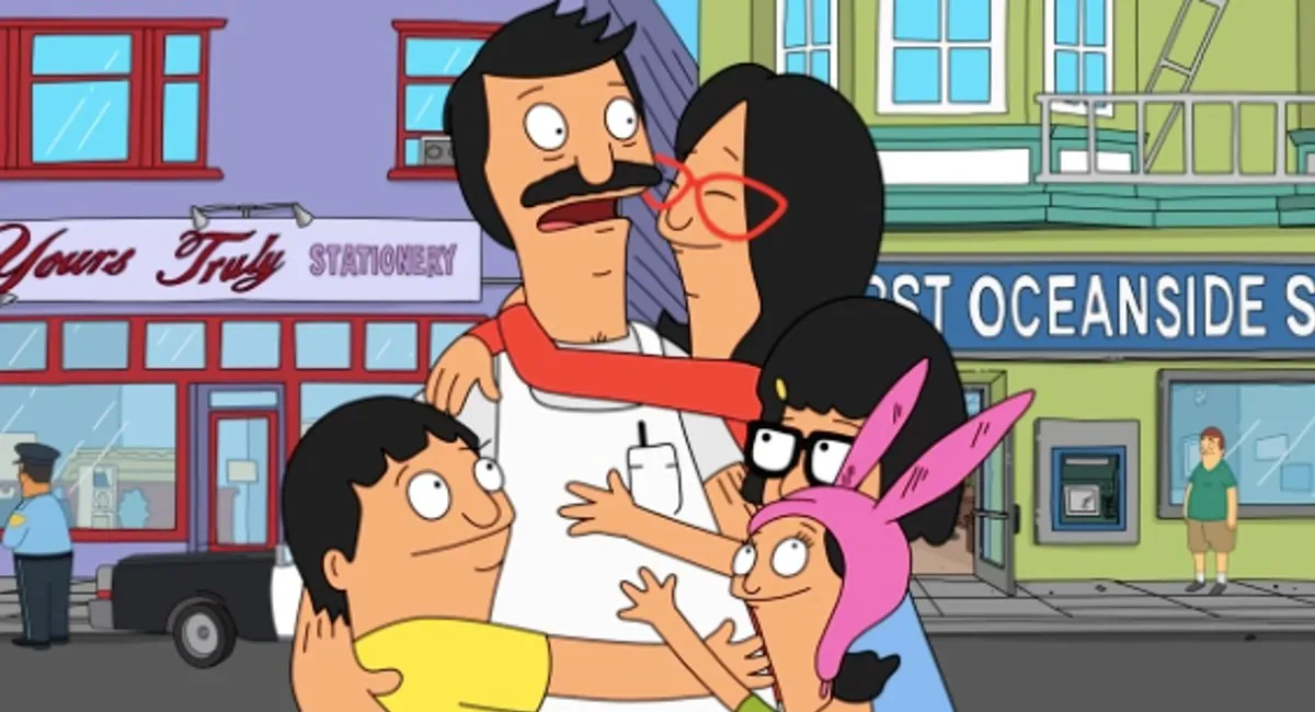The Belcher family stand together in a group hug