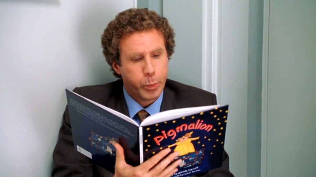 Will Ferrell as Buddy the Elf reading a kid's book in Elf.