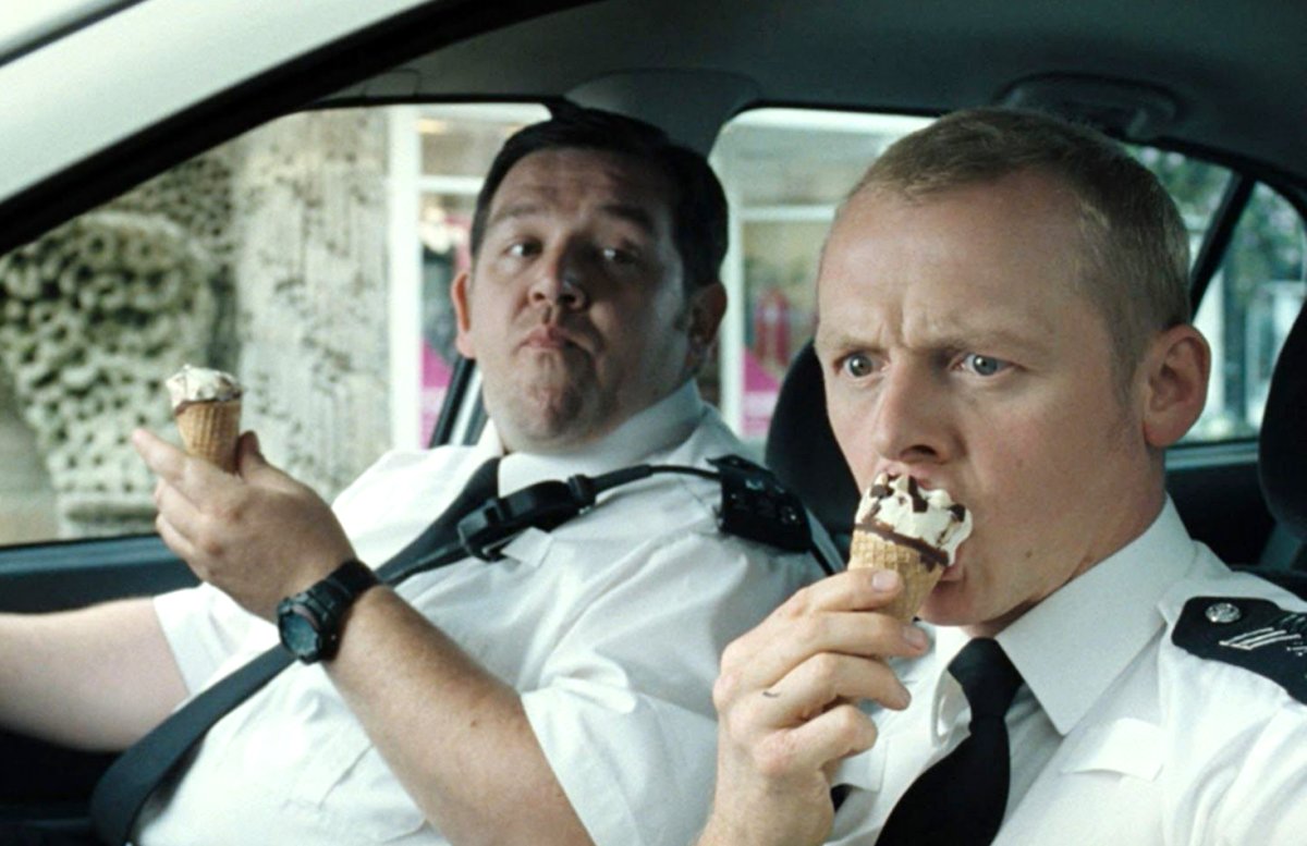 Two white male cops eating Cornetto ice creams in a car in "Hot Fuzz" 